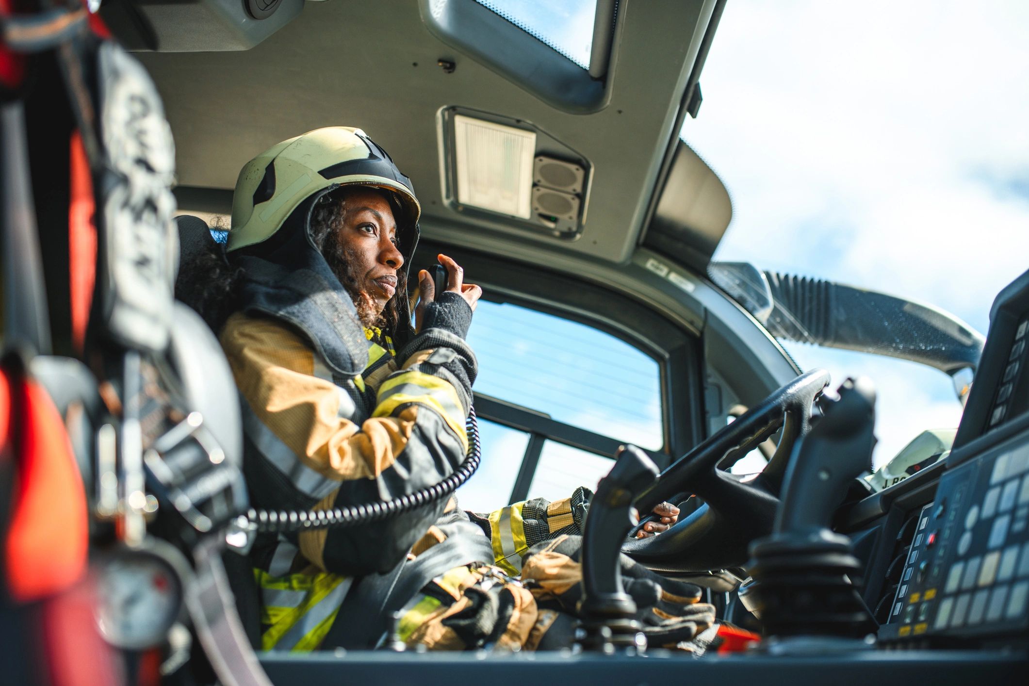 firefighter answering emergency phone call